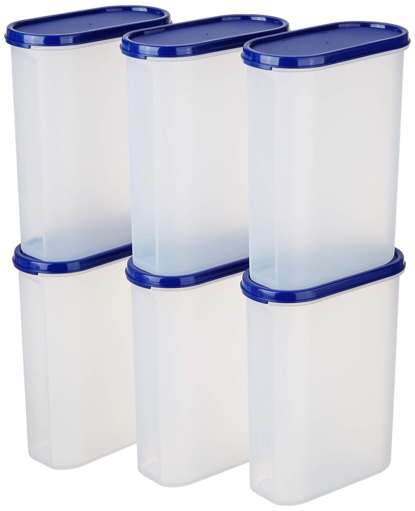 clear airtight storage containers organizing pantry shelves in farmhouse kitchen